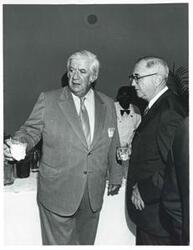 ["Black and white photograph print of Thomas P. O'Neill speaking with an unidentified gentleman during the Korean-U.S. Interparliamentary Conference. July 22-23, 1973"]