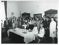 ["Black and white photograph print of Carl Albert posing with several members of his staff. See back of photo for individual names."]