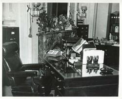 ["Black and white photograph print of the neat, clean desk of Charles L. Ward."]