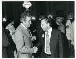 ["Black and white photograph print of Carl Albert with unidentified people at his birthday party, 1976"]
