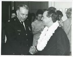 ["Black and white photograph print of Carl Albert with unidentified people at Albert's birthday party. May 10, 1974"]
