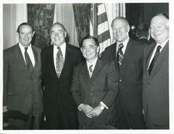 ["Black and white photograph print of Carl Albert, Gerald R. Ford and three other men."]