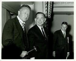 ["Black and white photograph print of Carl Albert with unidentified men."]