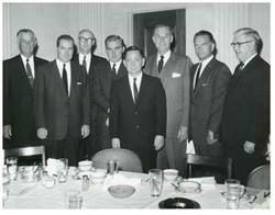 ["Black and white photograph print of Page Belcher, Ed Edmondson, Victor Wickersham, J. Howard Edmondson, Carl Albert, A. S. Mike Monroney, John Jarman, and Tom Steed."]