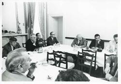["Black and white photograph print of Carl Albert, Robert Strauss, Russell B. Long, Robert C. Byrd, and others at a Democratic leadership conference."]
