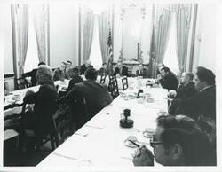 ["Black and white photograph print of Robert C. Byrd, John McFall, Thomas P. O'Neill, Robert Strauss, Carl Albert, Russell B. Long, and others at the Democratic leadership conference."]