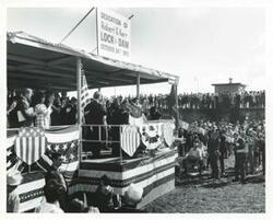 ["Black and white photograph print of Carl Albert, Dewey F. Bartlett, Lady Bird Johnson, David Hall, Ed Edmondson, and others at the dedication of the W. D. Mayo and Robert S. Kerr locks dams. October 24, 1970"]
