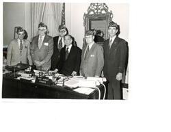 ["Black and white photograph of Carl Albert with a VFW group in Speaker's office.  Second from right is one Gerald Kelsey."]