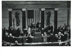 ["Black and white photograph of  Gerald R. Ford after being sworn into office. From left: Betty Ford, Carl Albert, Gerald R. Ford, James O. Eastland, and Richard M. Nixon. December 6, 1973"]