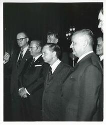 ["Black and white photograph print of Carl Albert with President Josip B. Tito of Yugoslavia and other men standing together. November 1971"]