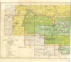["This document describes a detailed map of the Ouachita National Forest and surrounding areas, with various geographical coordinates, landmarks, and features including various roads, trails, and infrastructural elements. The map also details specific areas such as Hughes, Howe, Red Oak, and Wister Lake. It includes the U.S. Department of Agriculture Forest Service and landmarks such as BM 700, BM 551, and BM 9.81. The document also includes specific project names such as Summerfield #10 and Heavener #9. This map is intended for navigation and project planning purposes."]
