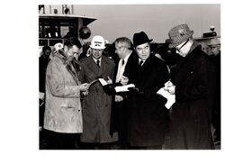 ["The image depicts Dewey Bartlett standing with Brigadeer General Parfitt, Mayor LaFortune, Ed Edmondson, and Colonel Harley Ladd"]