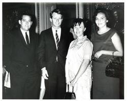 ["Freshmen senators occupy adjoining seats on the back row of the Senate chamber Left to right are Fred R. Harris, Joseph D Tidings, Robert F Kennedy, and Walter F Mondale July 1965 Negative"]