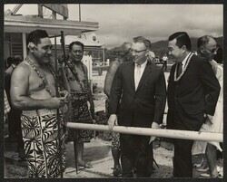 ["Caption: Governor Lee chats with Samoan chief during visit of Senator Inouye. Dec. 1962. Stamp: Photo: Government of American Samoa."]