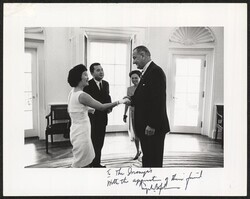 ["Caption: Mrs. Spark Matsunaga, Senator Daniel Inouye, Rep. Patsy Mink, President Lyndon Johnson. Signed on front: To the Inouye's with the appreciation of their friend Lyndon B. Johnson."]