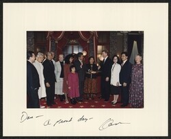 ["Signed on front: Dan - A proud day, Dan. Stamp: Official White House Photo."]