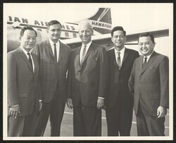 ["Caption: Full house of five smiling kings: Below are the Democratic victors snapped just at takeoff before a triumphal flight around the Islands. L to R., Congressmen-elect Sparky Matsunaga and Tom Gill; Governor Burns; Lt. Governor William Richardson, Se"]