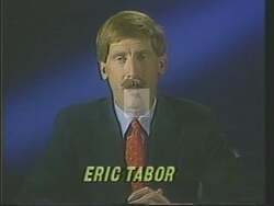 ["In the 1988 campaign ad, Democratic candidate Eric Tabor emphatically advocates for budget reform. He proposes significant cuts to military spending and political salaries, redirecting funds toward essential public services like education, healthcare, and economic development. Tabor stresses the need to slash the budget deficit by eliminating wasteful expenses, passionately addressing the nation's financial challenges and prioritizing community investment at several public events."]