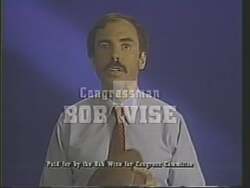 ["In his 1988 presidential campaign ad, Democratic candidate Robert Ellsworth Wise emphasizes the power of teamwork in advancing West Virginia's development. Standing in various settings including podiums and a football field, Wise compares governance to team sports, advocating for collaborative leadership through the formation of a West Virginia Leadership Council."]
