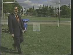 ["The 1988 political TV ad for Democratic Party candidate Tom Luken centers on the theme of fiscal responsibility. Featuring Luken in both suit and football attire, the ad utilizes football metaphors to emphasize tackling government deficit and promoting budget cuts. Luken appears determined and energetic, addressing fiscal challenges and advocating for government spending reforms in various settings."]