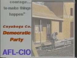 ["In the 1994 political TV ad for Democratic presidential candidate Francis E. Gall, he is portrayed consistently as a trustworthy and confident leader. Throughout various scenes, Gall is shown addressing large, attentive crowds from a podium, with campaign banners in the backdrop. The repetitive nature of these scenes emphasizes his dedication, leadership abilities, and electoral commitment, aligning him strongly with themes of reliability and professionalism in the political arena."]