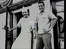 ["In the 1994 TV ad, Democratic candidate Duke DeTremble campaigns for Congress, exuding confidence and leadership at various rallies. Scenes of DeTremble addressing enthusiastic crowds, detailing his achievements, and pledging effective service dominate the ad, positioning him as a dedicated and trustworthy choice for congressional office. Supporters appear inspired and supportive in every scene."]