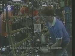 ["In the 1988 political ad, Democratic candidate Tom Murray vehemently emphasized revitalizing local economies by advocating for workers' rights and infrastructure improvement. Addressing various crowds at rallies and factories, Murray consistently highlighted his commitment to protecting jobs. Visible symbols like American flags, campaign posters, and interactions with workers reinforced his dedication to labor rights."]