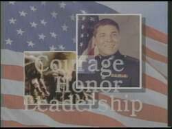 ["In the 1996 campaign ad, Democratic Presidential candidate Darryl F. Roberts, a Marine veteran, criticizes Republican Wes Watkins and his party for prioritizing the wealthy, highlighting a betrayal of community values and veteran support. With strong visual symbolisms of loyalty and duty, Roberts passionately addresses the camera, emphasizing the political failures impacting healthcare and education, urging a return to genuine dedication to American communities and values."]