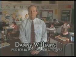 ["In his 1996 campaign ad, Democratic candidate Danny Williams emphatically opposes federal education budget cuts. With scenes spanning from offices to schools, Williams���������a serious, earnest school board member���������speaks directly to the camera, advocating for preserved education funding and fiscal balance. His commitment is underscored by various backdrops, including campaign banners and community halls."]