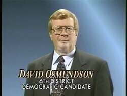 ["In the 1996 political ad, David L. Osmundson, a Democratic candidate for Congress, earnestly promotes the ideals of unity, fiscal responsibility, and bipartisan cooperation. Throughout the advertisement, Osmundson, with a serious demeanor, urges addressing key governmental and district challenges through responsible governance, consistently advocating for bipartisan communication and collaboration against campaign-themed backdrops."]