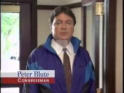 ["In his 1996 campaign ad, Republican Peter I. Blute confidently addresses viewers amid various settings, from an office to outdoors. He consistently dismisses negative ads and accusations, positioning himself as a candidate committed solely to his constituents, untainted by special interest influences, and poised in the face of adversity."]