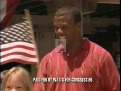 ["In a 1996 political TV ad, Republican candidate Julius Ceasar Watts is portrayed as a confident and trustworthy leader amid iconic Oklahoma scenery. Scenes show Watts speaking energetically from a podium, interacting intimately with local constituents, and exhibiting leadership qualities, all underscored by a backdrop of American flags and engaged audiences."]