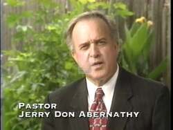 ["In a 1996 political TV ad, Republican candidate J.C. Watts is showcased through a series of engaging scenes at various podiums, passionately advocating for leadership rooted in integrity and moral strength. Speakers, including Watts, emphasize his exemplary character and commitment to values before attentive, supportive crowds in diverse venues."]