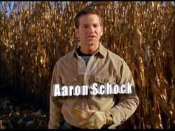 ["In his 2008 political ad, Republican candidate Aaron Schock advocates from an Illinois cornfield, emphasizing the significance of biofuels and agriculture to economic and energy security. Throughout various scenes, Schock consistently promotes support for the agricultural economy as a vital policy cornerstone, reinforcing this message in multiple scenic shots of lush cornfields."]