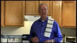 ["In a compelling 2012 political TV ad, Dennis Hall, a middle-aged, non-career politician and Vietnam veteran, confidently introduces himself as a Congressional candidate. Utilizing scenes from offices to cityscapes, he emphasizes his diverse background and qualifications. Hall earnestly speaks to the camera, advocating for his run and seeking support, surrounded by American flags and campaign materials."]